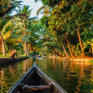 shutterstock_408038542-Kerala-backwaters-tourism-travel-in-canoe-boat-Kerala-min